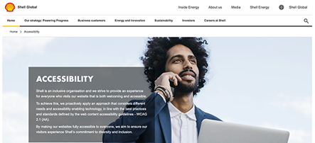 Shell's 'Accessibility' site features a visual of a man holding a phone and a text box with information about Shell's accessibility endeavours.