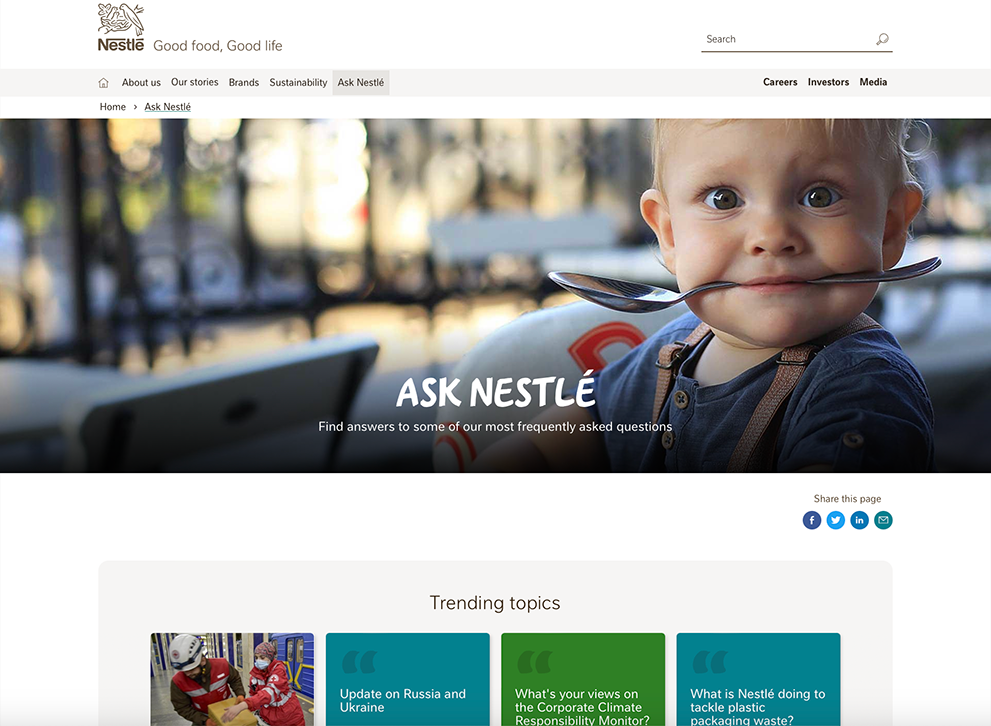 The Ask Nestle site features a visual of a curious toddler with a large spoon in his mouth. A "trending topics" header features above article panels