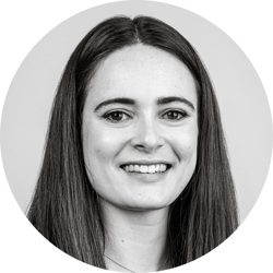 Georgia Barrett. Georgia is a young white woman with long brown hair. She is smiling at the camera.